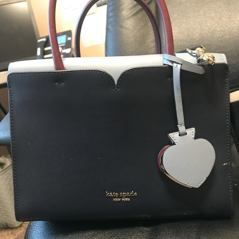 Kate spade authentic sachels.  New.  Large light color is blue. Asking 180 obo